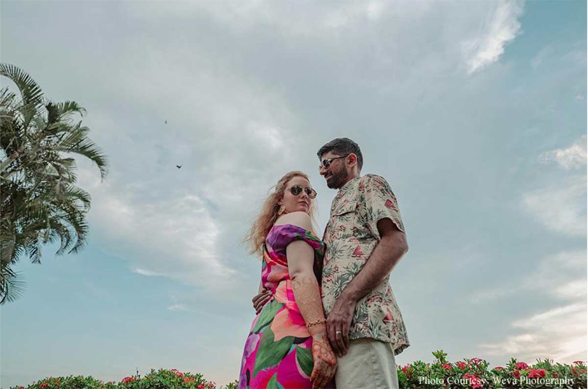 Framed by tranquil backwaters, this cross-cultural wedding came alive with the culture and verdant beauty of Kerala!