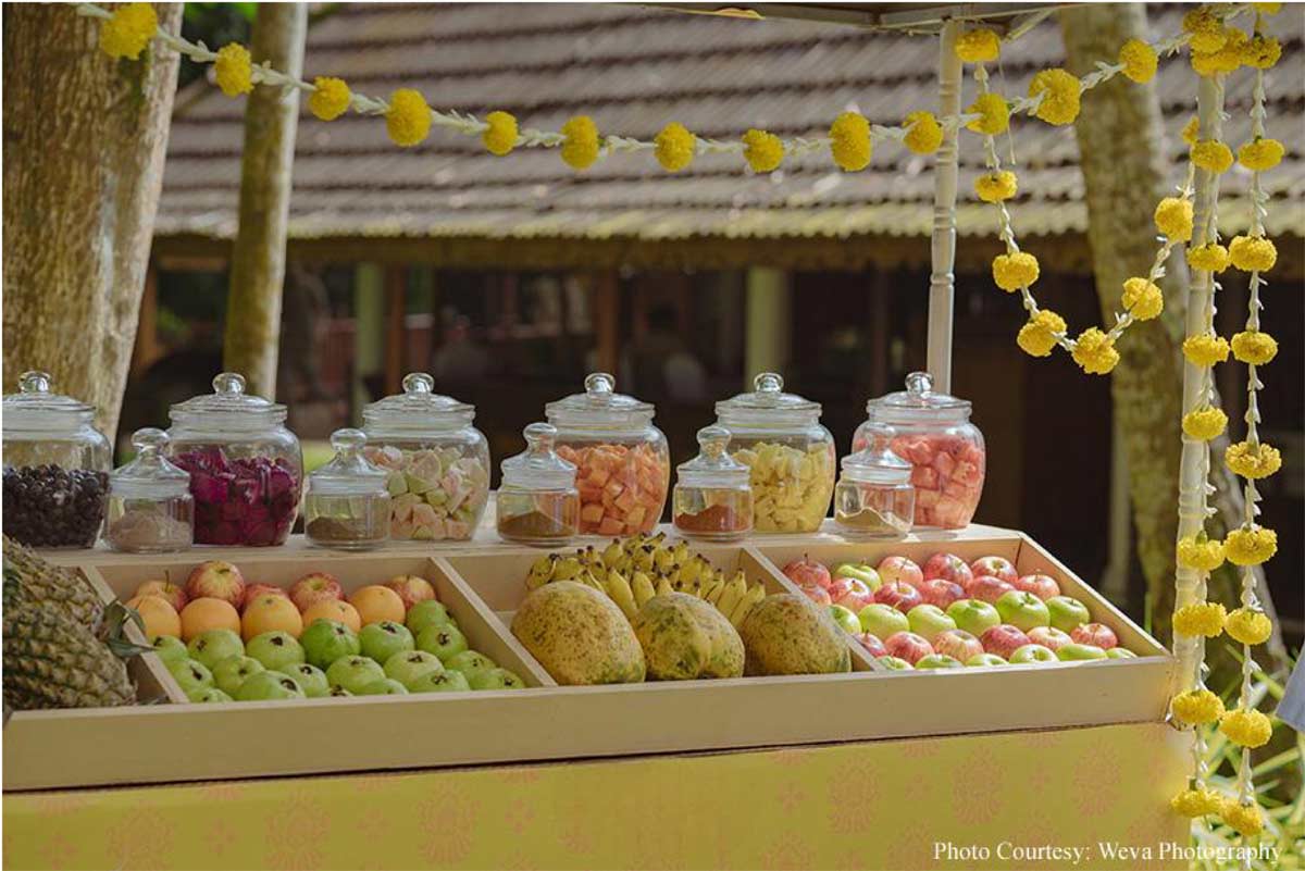 Framed by tranquil backwaters, this cross-cultural wedding came alive with the culture and verdant beauty of Kerala!